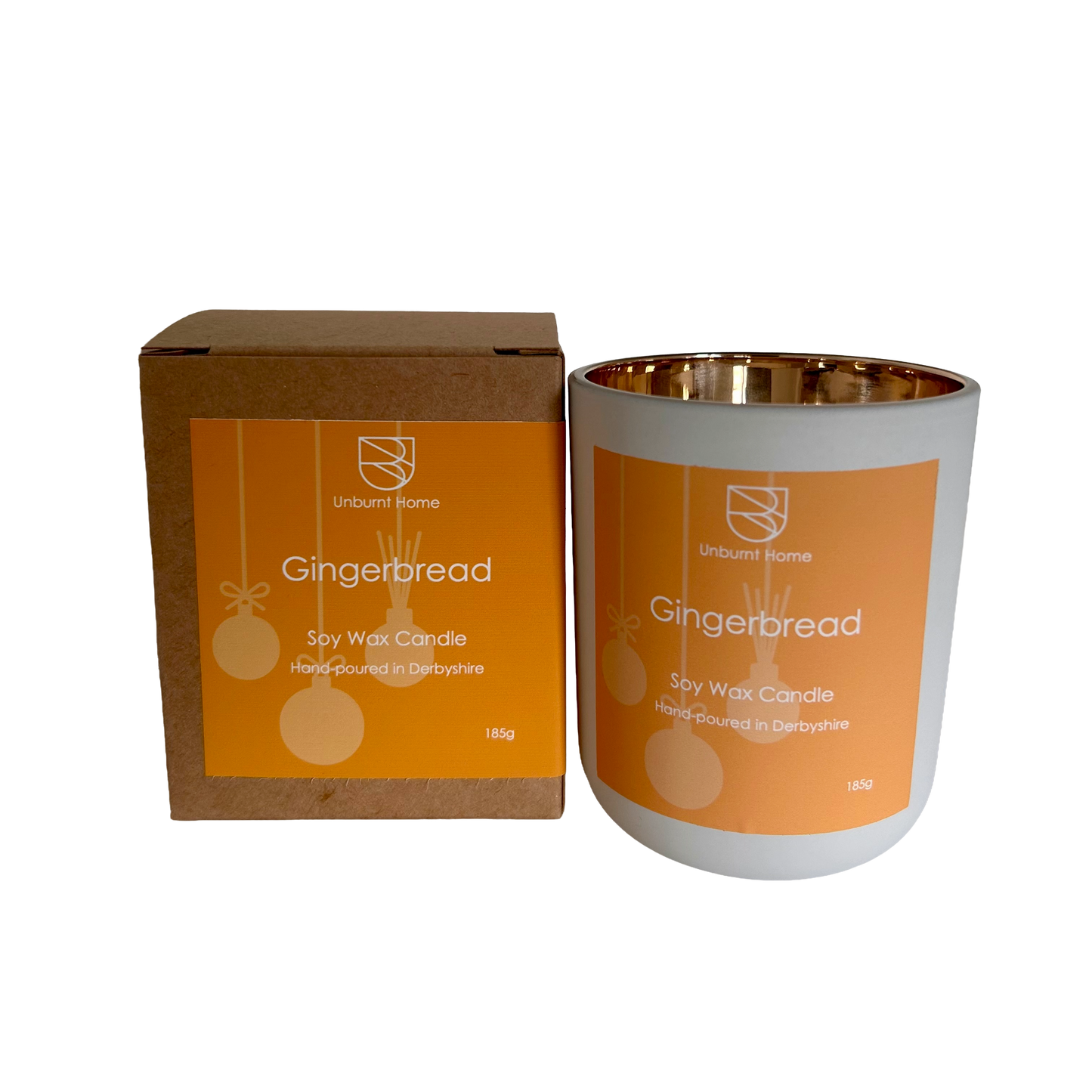 Gingerbread soy wax candle with packaging on a white background