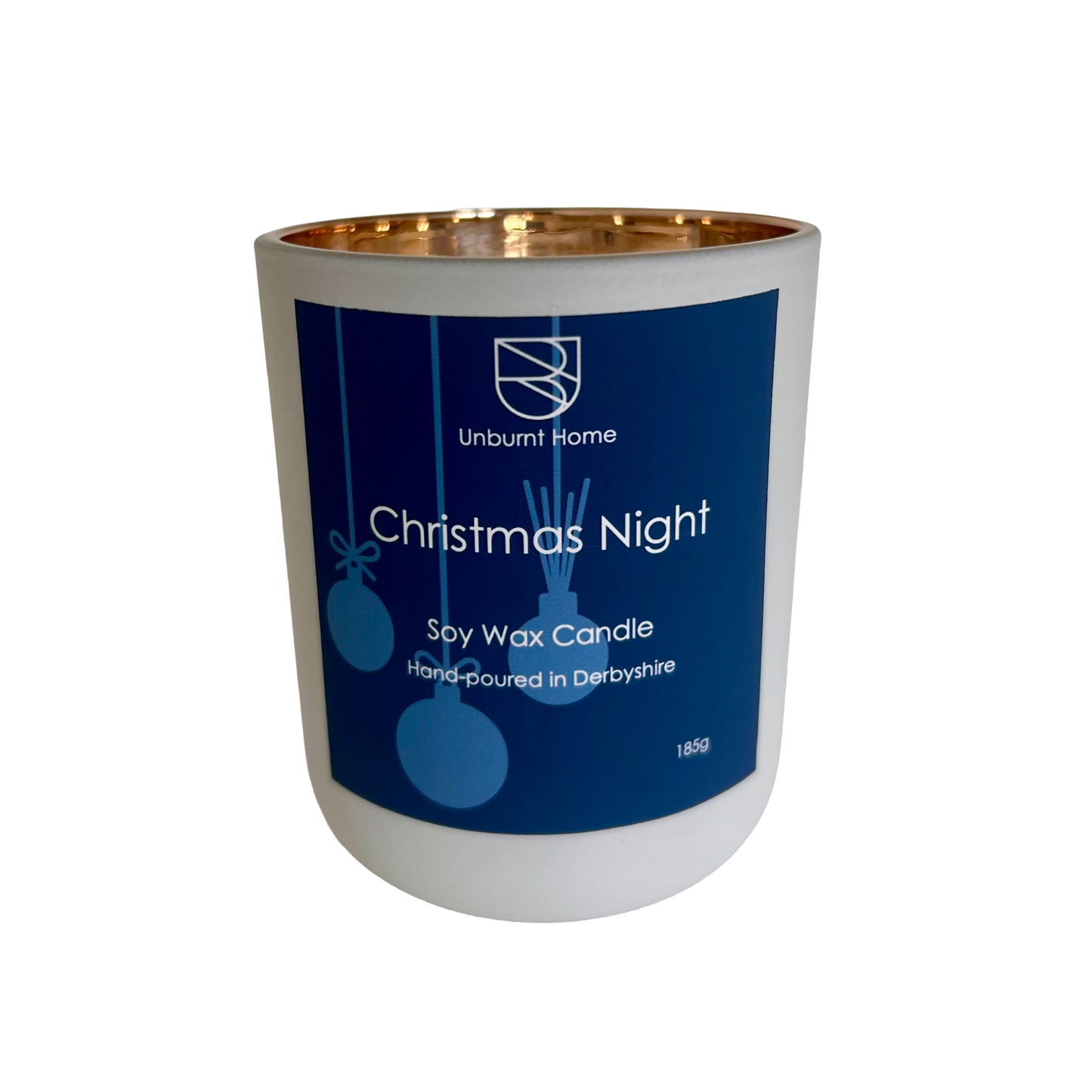 Christmas Night Christmas Candle in a while jar with gold interior with blue label with white text on a white background