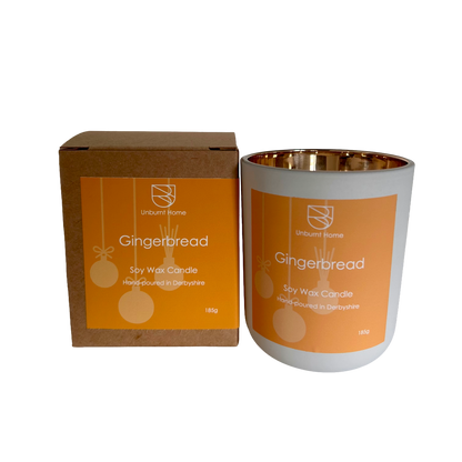 Gingerbread soy wax candle with packaging on a white background