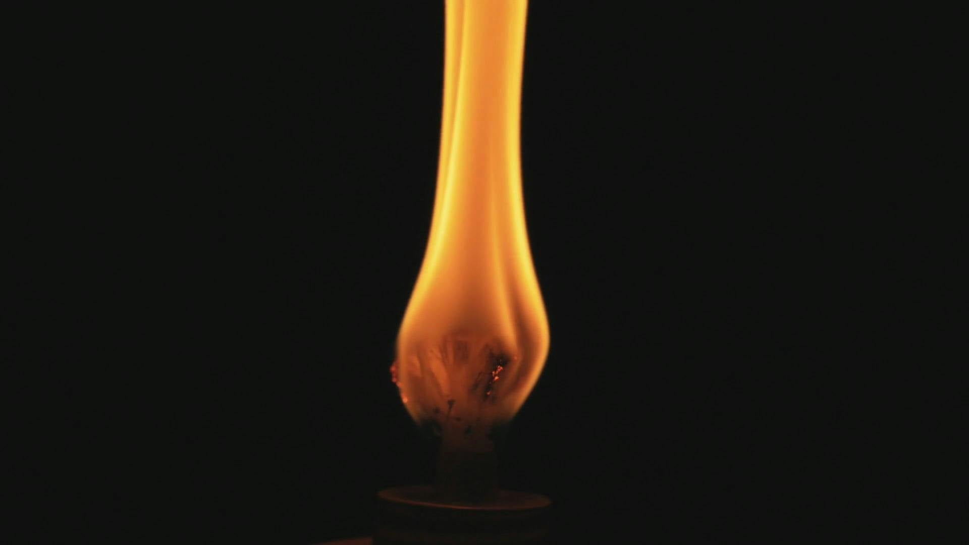 candles burning in the dark