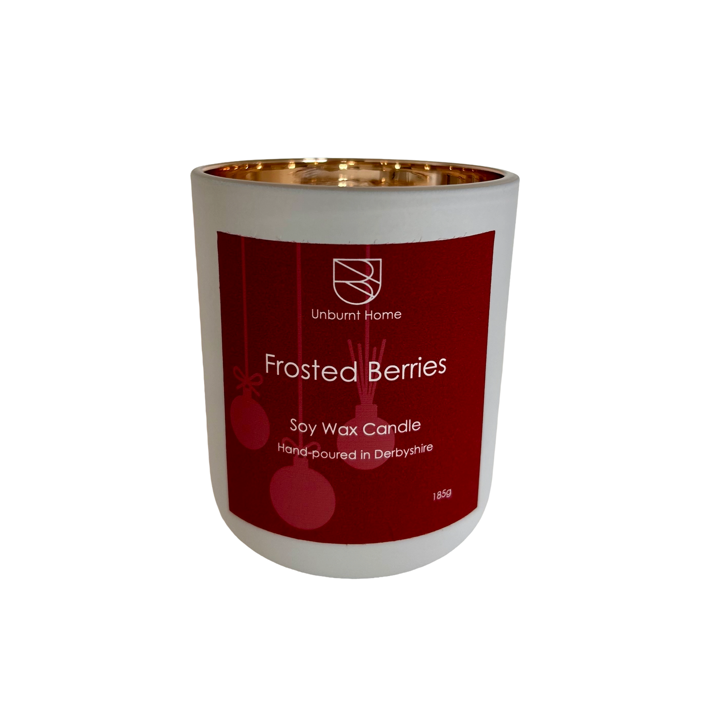 Frosted berries Christmas candle on a white background