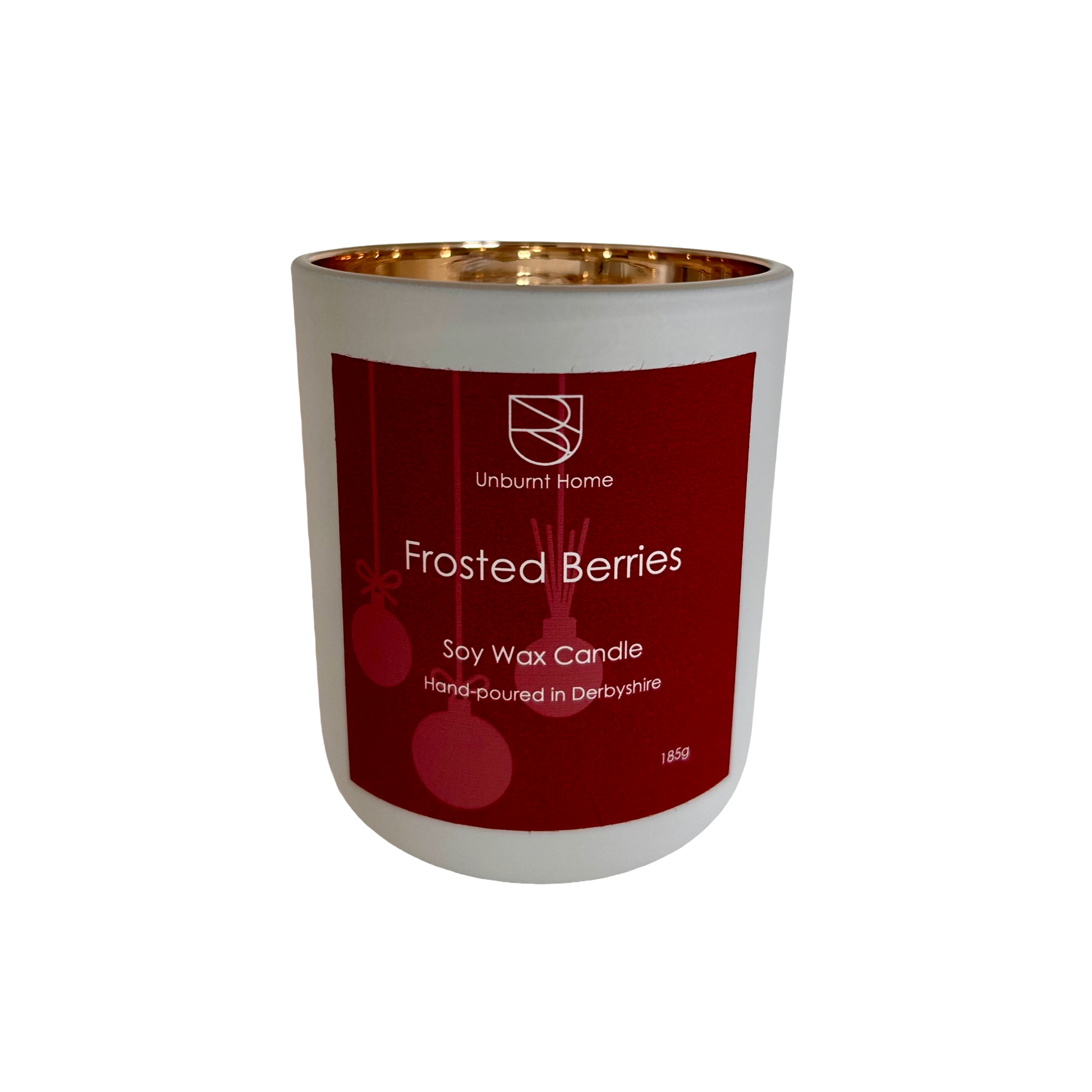 Frosted berries Christmas candle on a white background