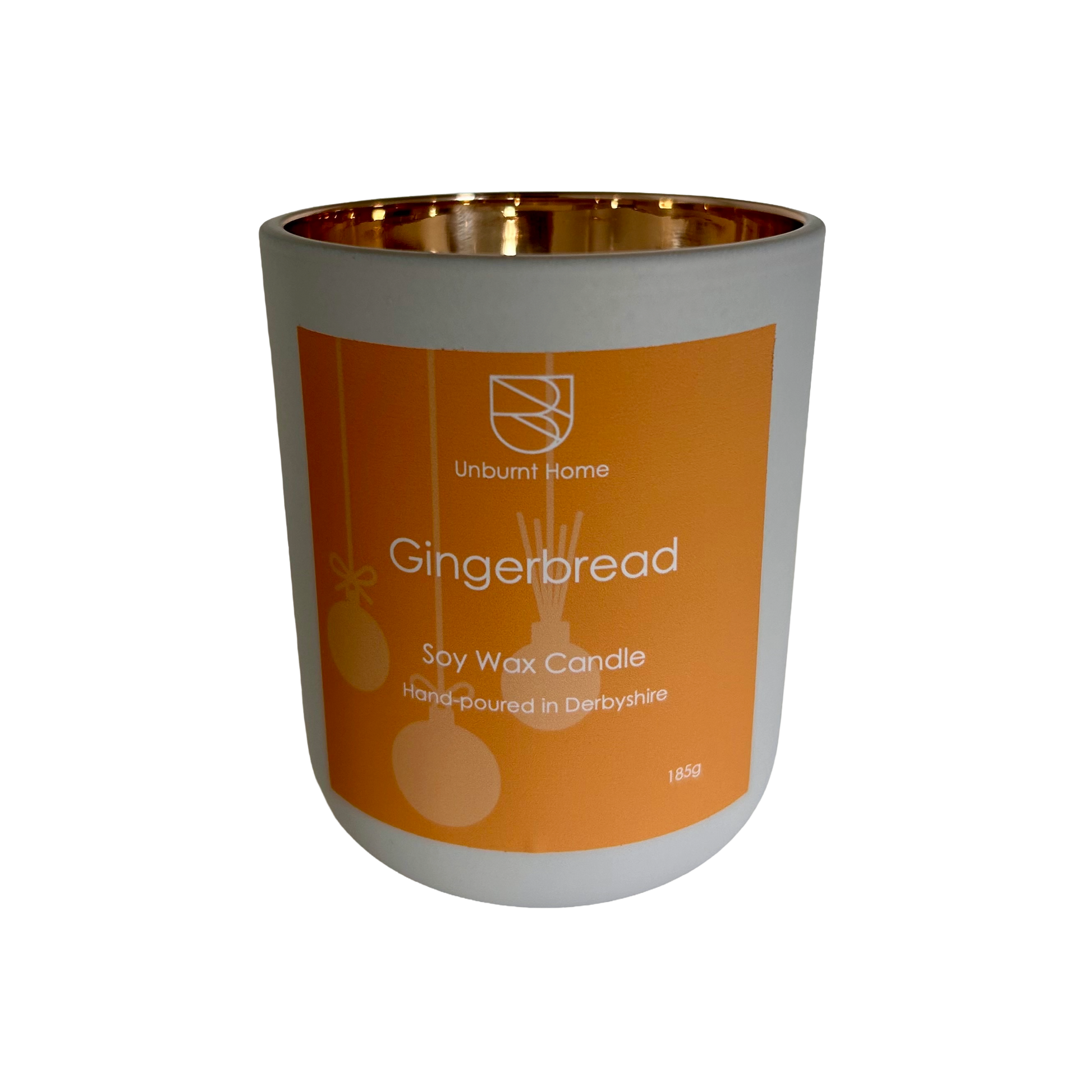Gingerbread Candle in white jar with gold interior on a white background