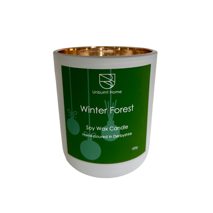 Winter Forest Christmas candle in a white jar on a white background