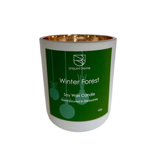 Winter Forest Christmas candle in a white jar on a white background